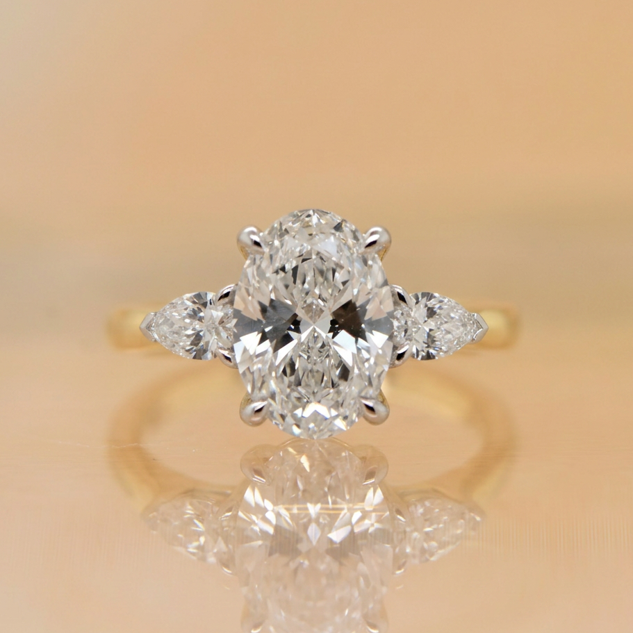 Chloe | 2.52ct Oval & Pear Cut Lab Grown Diamond Trilogy Engagement Ring | 18ct Yellow & White Gold