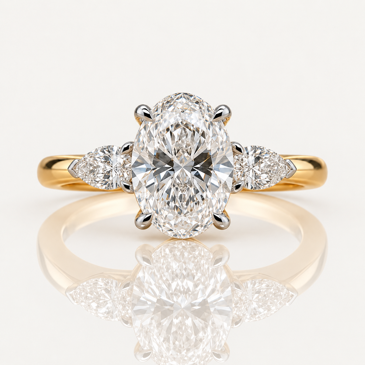 Chloe | 2.52ct Oval & Pear Cut Lab Grown Diamond Trilogy Engagement Ring | 18ct Yellow & White Gold