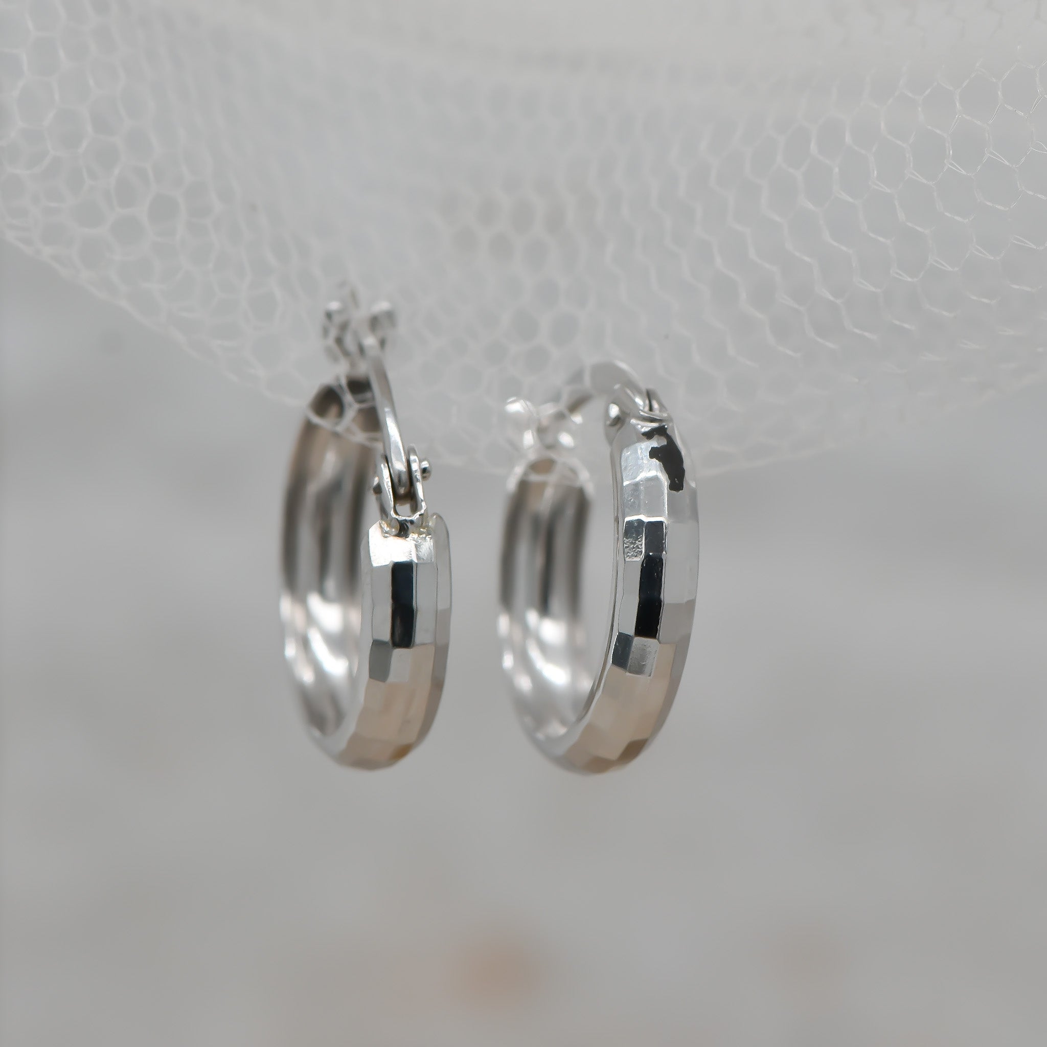 white gold faceted huggies
