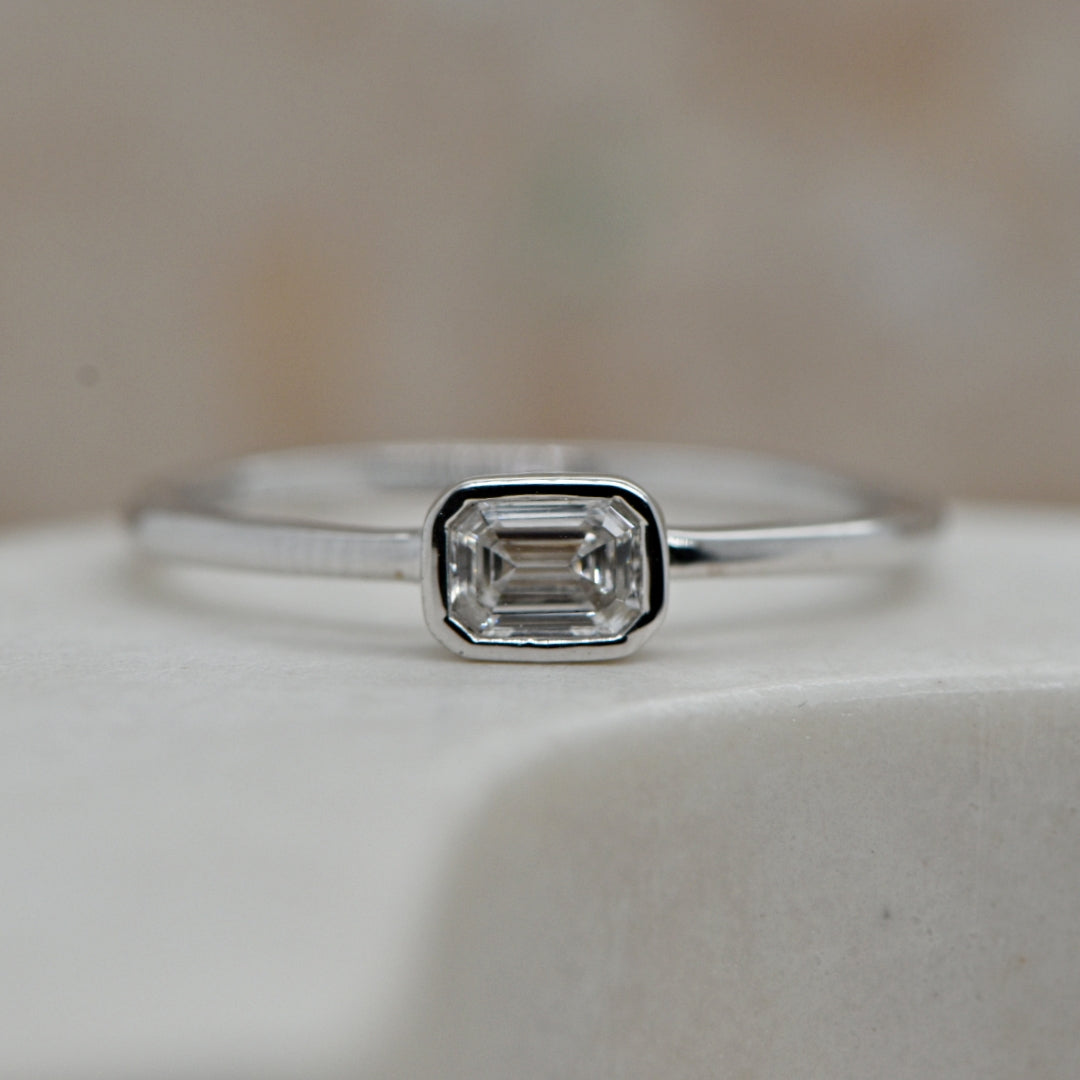 9CT GOLD - LAB GROWN EMERALD CUT DIAMOND BEZEL SET SOLITAIRE