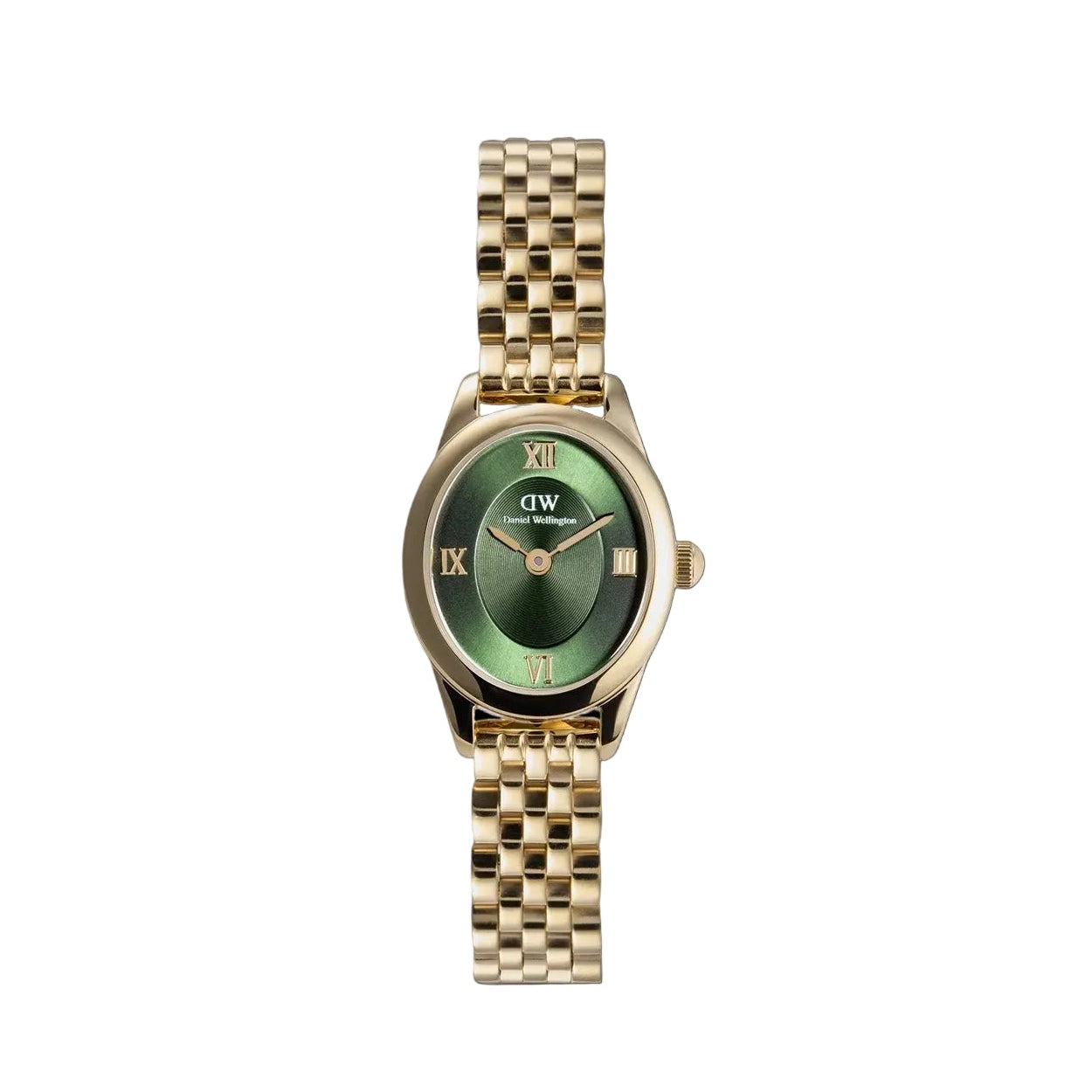 A gold-tone wristwatch with a green dial and Roman numeral markers, centered on a solid black background. The brand logo 'dw' is visible on the dial.