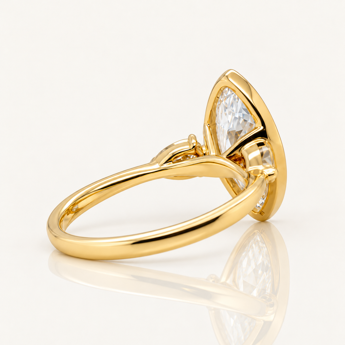 3.07ct Marquise Lab Grown Diamond Bezel Engagement Ring with Pear Sides | 9ct Yellow Gold