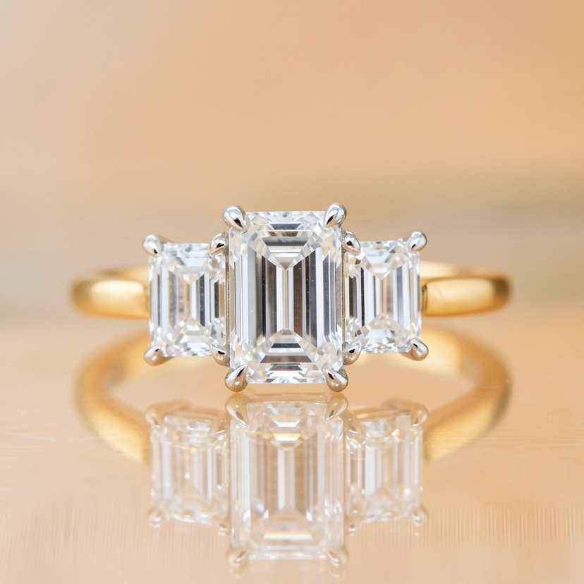 Hazel | 1.50ct Emerald Cut Lab Grown Diamond Trilogy Engagement Ring | 18ct Yellow & White Gold