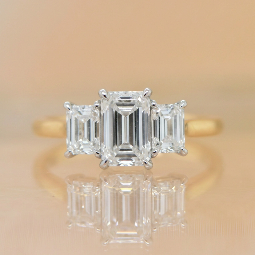 Hazel | 1.50ct Emerald Cut Lab Grown Diamond Trilogy Engagement Ring | 18ct Yellow & White Gold