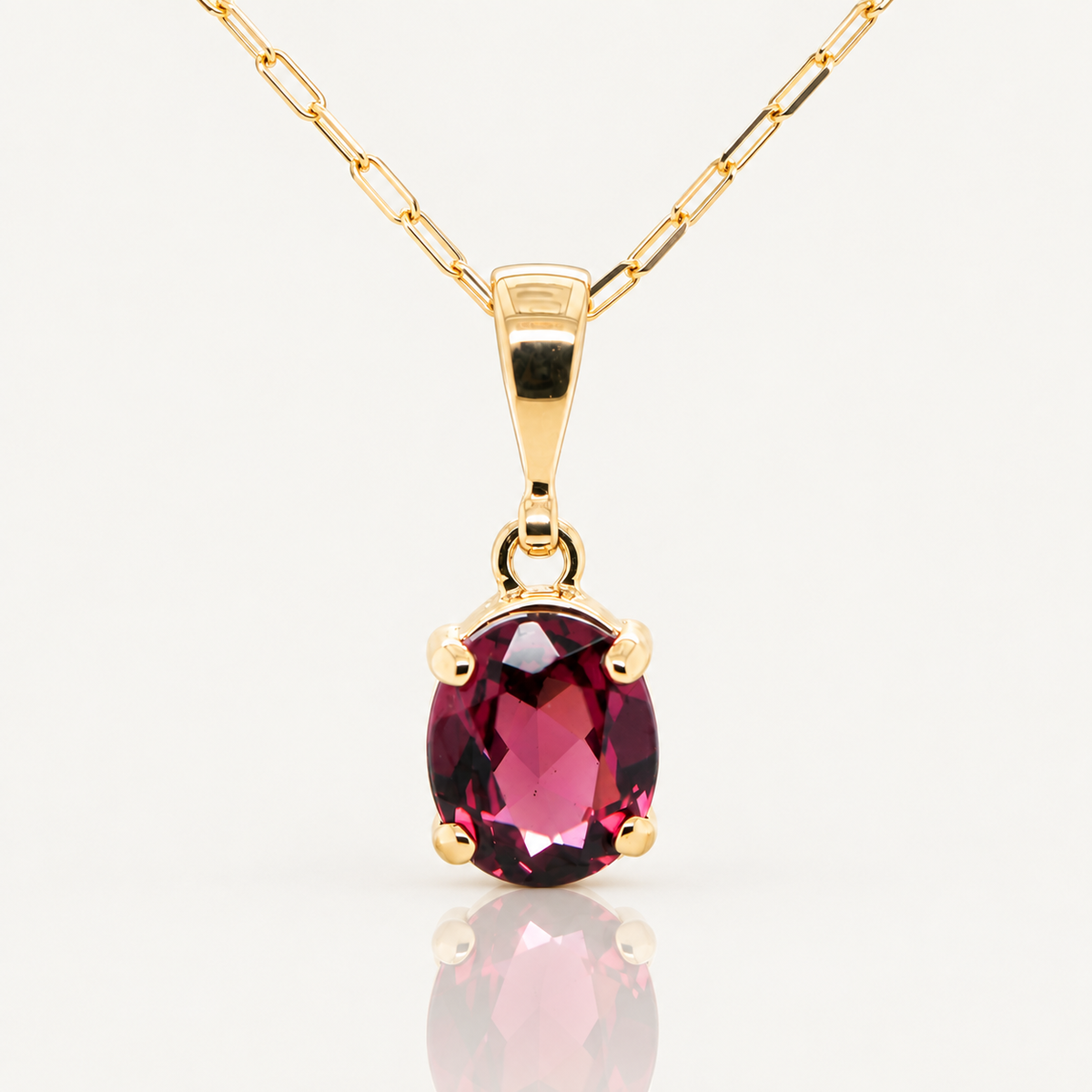 Oval Rhodolite Garnet Pendant | 9ct Yellow Gold