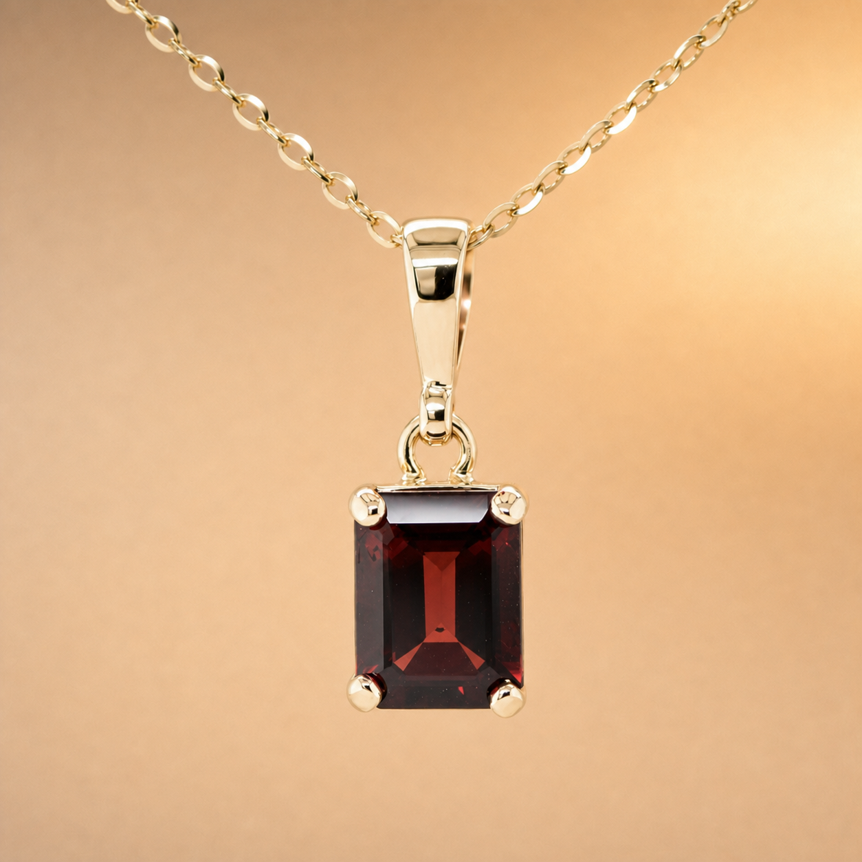 Yellow Gold Emerald cut Garnet pendant