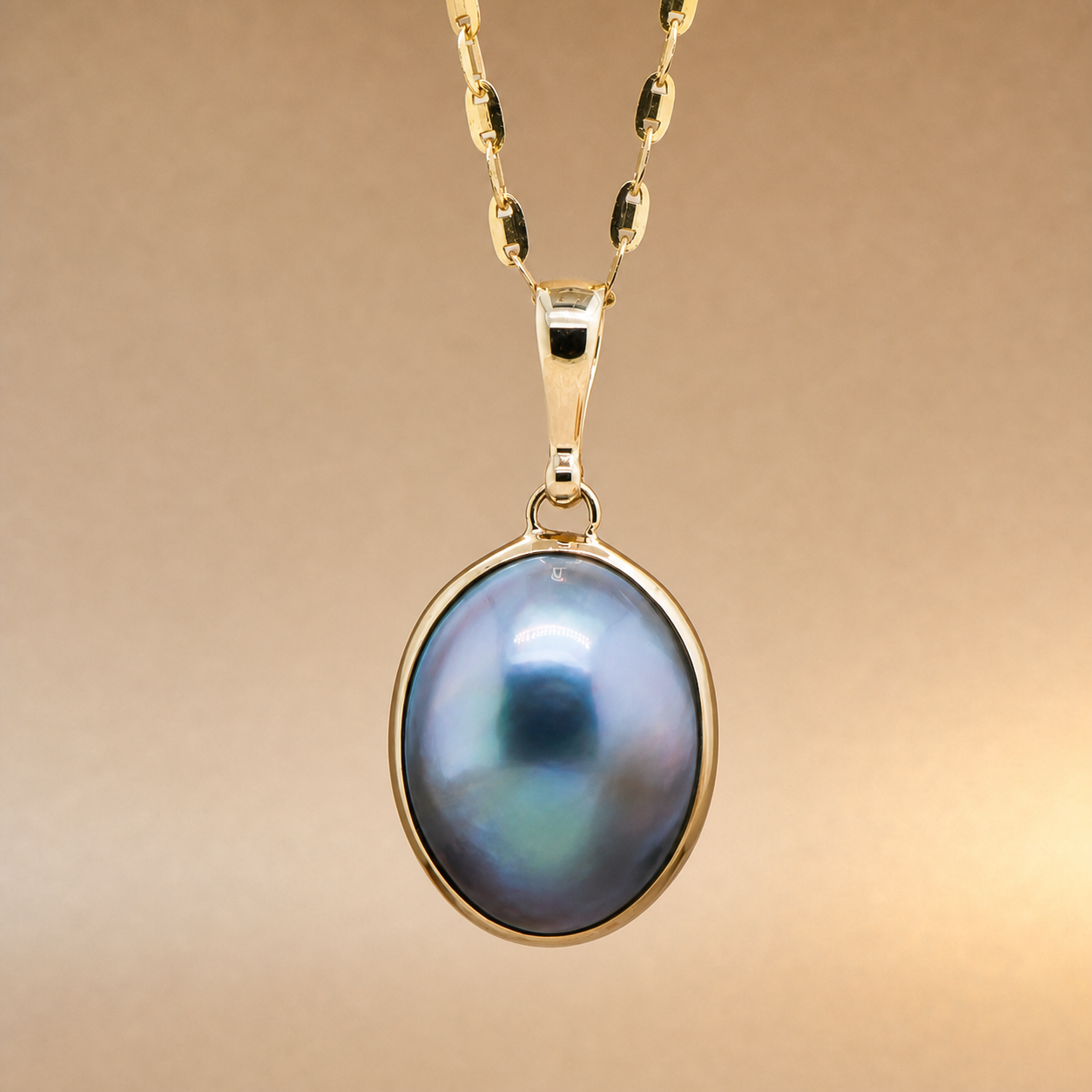 9ct Oval Black Mabe Pearl Pendant