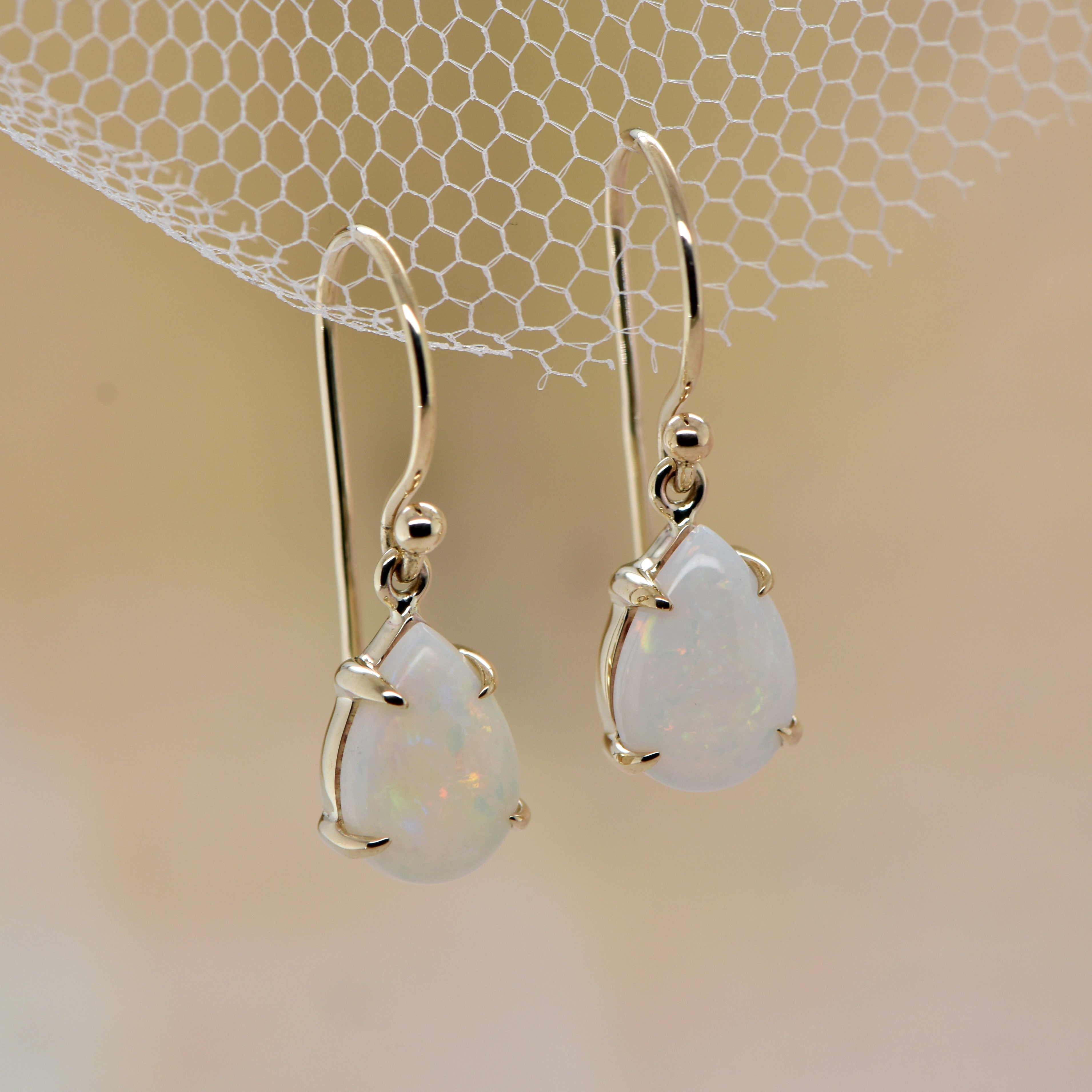 pear cut  white opal drop earrings