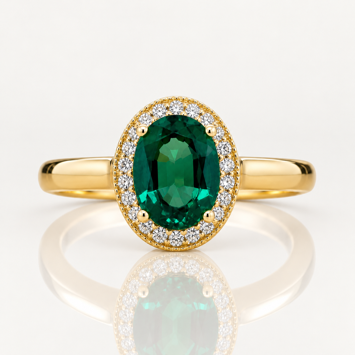 Oval Created Emerald & Diamond Halo Ring | 9ct Yellow Gold