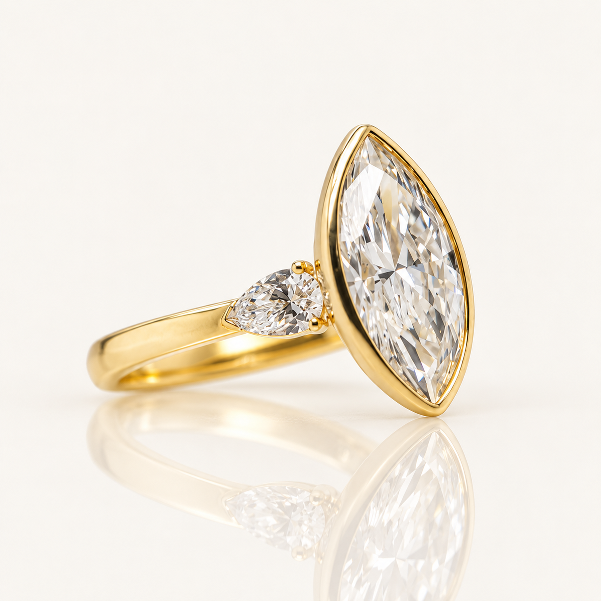 3.07ct Marquise Lab Grown Diamond Bezel Engagement Ring with Pear Sides | 9ct Yellow Gold