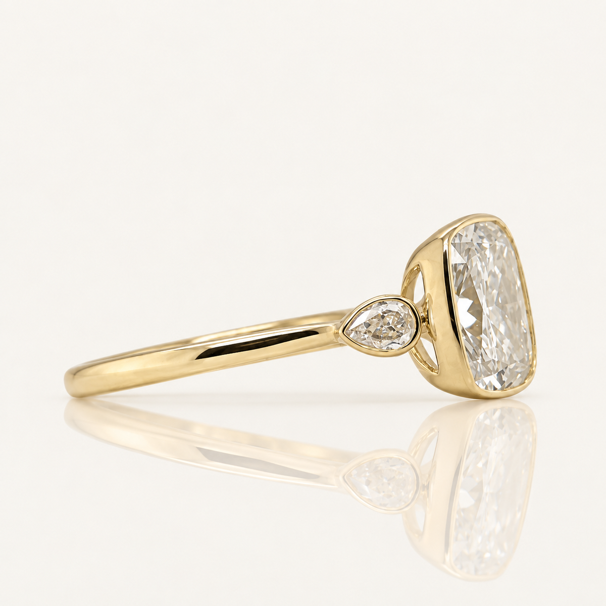 2.09ct Cushion Cut Lab Grown Diamond Bezel Engagement Ring with Pear Sides | 9ct Yellow Gold