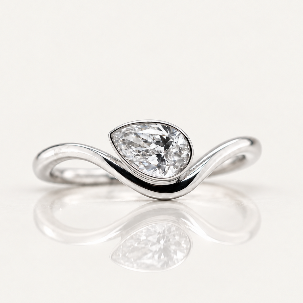 0.54ct Pear Cut Lab Grown Diamond East-West Bezel Ring | 9ct White Gold