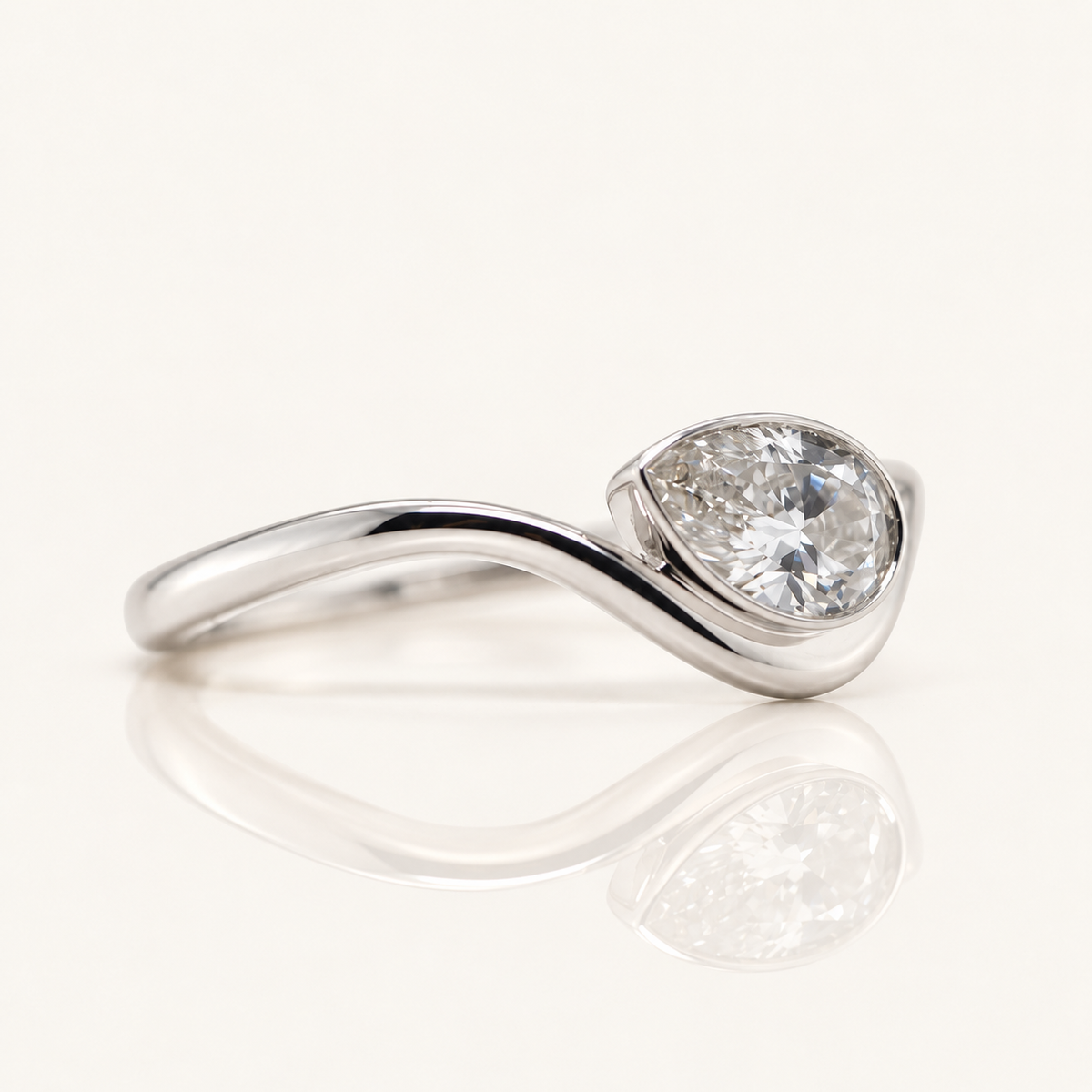 0.54ct Pear Cut Lab Grown Diamond East-West Bezel Ring | 9ct White Gold