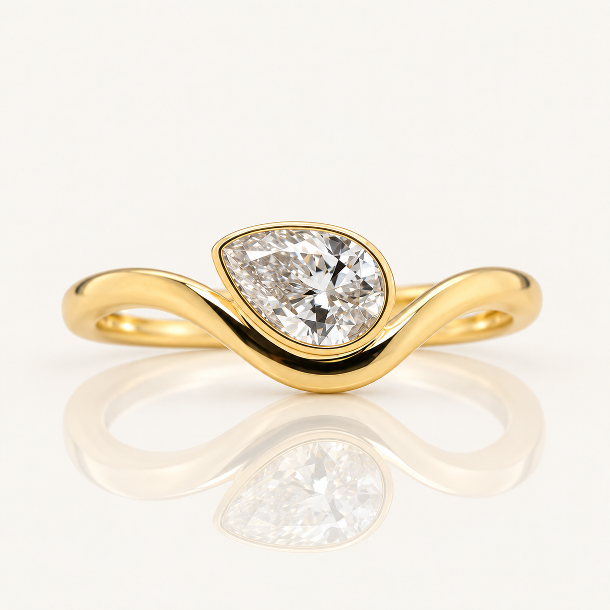 0.52ct Pear Cut Lab Grown Diamond East-West Bezel Ring | 9ct Yellow Gold