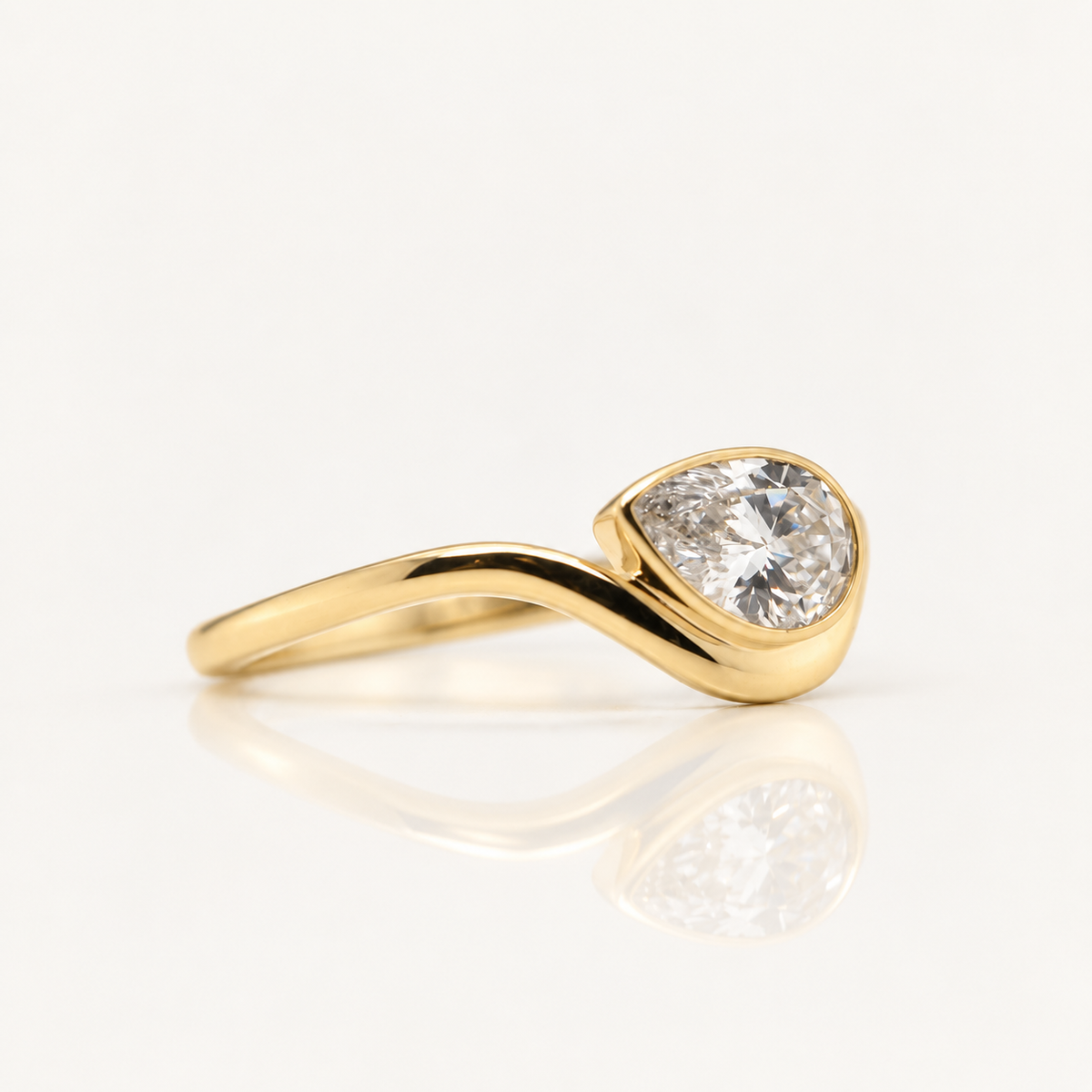 0.52ct Pear Cut Lab Grown Diamond East-West Bezel Ring | 9ct Yellow Gold