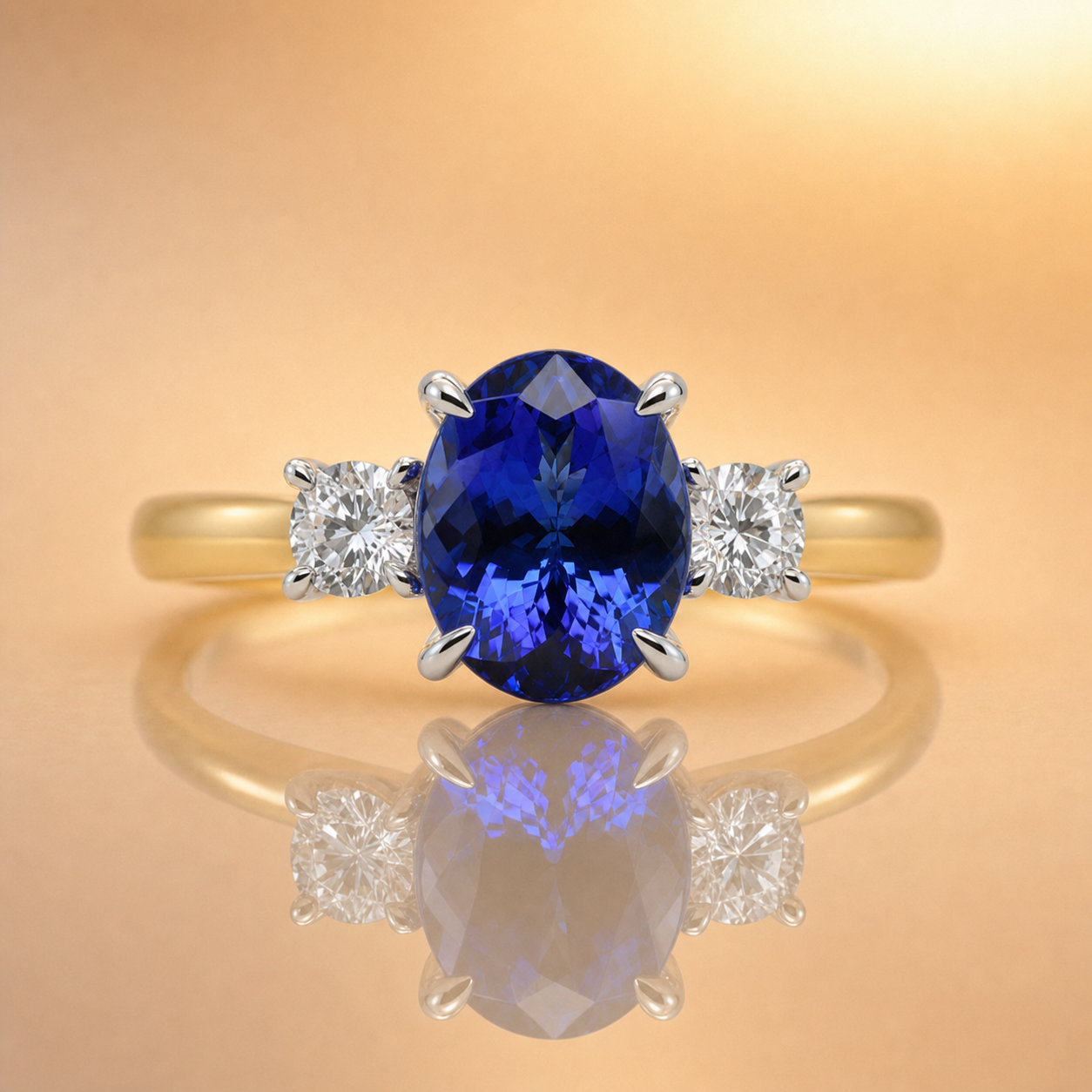 Carmen | 3.48ct Oval Tanzanite & Diamond Three-Stone Ring | 18ct Yellow & White Gold