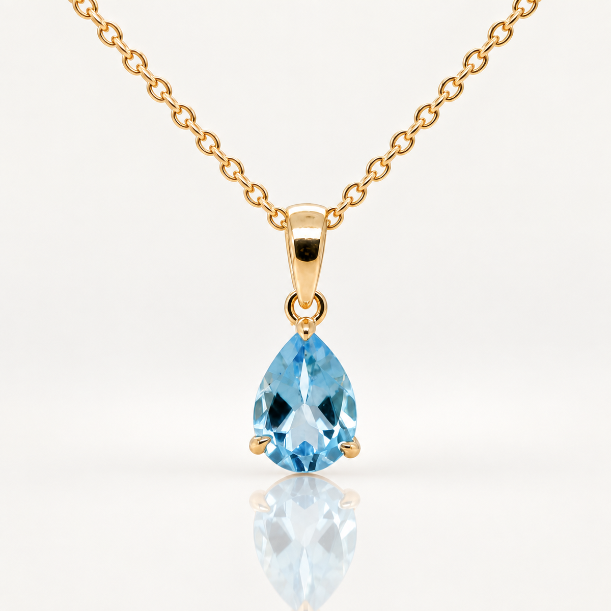 Pear Blue Topaz Pendant | 9ct Yellow Gold