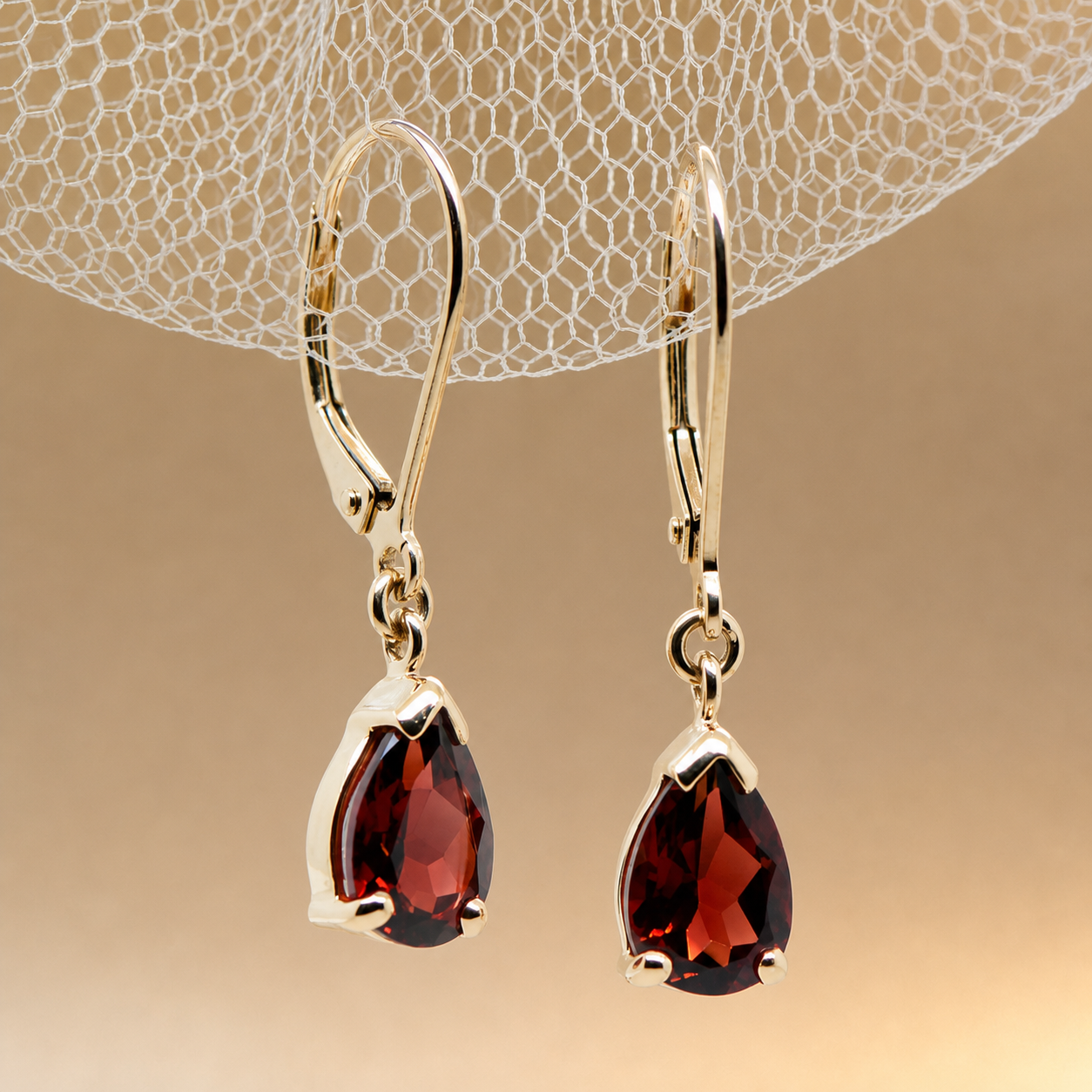 Pear cut Garnet drop earrings